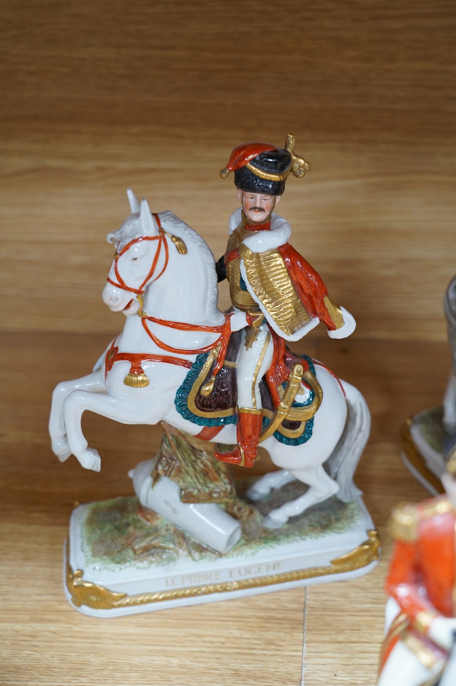 A group of eight Italian porcelain figures on horseback, tallest 30cm. Condition - fair